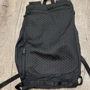 Lululemon black roll up backpack